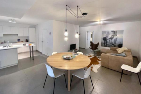 Apartment with free covered parking - City Center